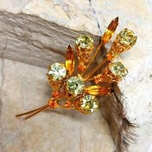 Vintage crystal brooch orange and green